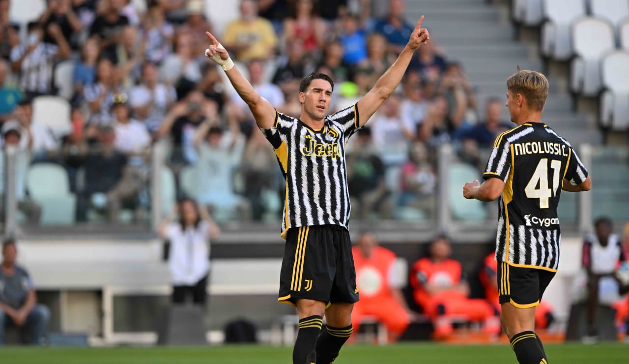 Dusan Vlahovic of Juventus and Christiano Biraghi of Acf Fiorentina during  the Italian serie A, football match between Juventus Fc and Acf Fiorentina  on 12 February 2023 at Allianz Stadium, Turin, Italy.